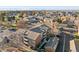 Aerial view of condo building, ample parking, and mountain views at 10150 E Virginia Ave # 2-205, Denver, CO 80247