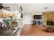 Living room with kitchen, dining area and fireplace at 10150 E Virginia Ave # 2-205, Denver, CO 80247