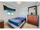 Bedroom with a double bed and dresser at 2241 Dexter Dr # 3, Longmont, CO 80501