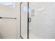 Clean shower with subway tile and glass enclosure at 294 Dipper Ct, Berthoud, CO 80513