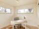 Bright home office features a desk, chair, and hardwood floors at 6178 S Westview St, Littleton, CO 80120