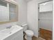 Bathroom with white vanity, toilet and linen closet at 5550 W 80Th Pl # 20, Arvada, CO 80003