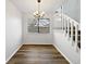 Bright dining room with hardwood floors and chandelier at 5550 W 80Th Pl # 20, Arvada, CO 80003