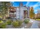 Gray two-story condo building with balconies and landscaping at 17662 E Loyola Dr # 2132L, Aurora, CO 80013