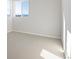 Bright bedroom with carpet flooring and window view at 1742 Morgan Dr, Erie, CO 80516