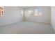 Spacious bedroom with neutral walls and carpet at 1742 Morgan Dr, Erie, CO 80516
