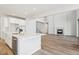 Spacious kitchen with island, stainless steel appliances, and white cabinetry at 1742 Morgan Dr, Erie, CO 80516