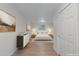 Bright bedroom with light wood floors and ample closet space at 8467 W 62 Pl, Arvada, CO 80004