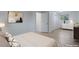 Virtually staged bedroom with dresser and large bed at 8467 W 62 Pl, Arvada, CO 80004