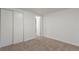 Simple and bright bedroom with double door closets at 8467 W 62 Pl, Arvada, CO 80004