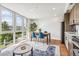Modern dining area with city views at 3575 Chestnut Pl # 605, Denver, CO 80216