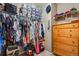 Large walk-in closet with ample shelving and hanging space at 15352 E 117Th Ave, Commerce City, CO 80022