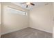 Well-lit bedroom with carpet and ceiling fan at 1625 King St # 4, Denver, CO 80204