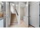 Bright entryway with staircase, powder room, and storage at 1625 King St # 4, Denver, CO 80204