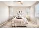 Well lit bedroom with carpeted floor and ceiling fan at 17207 E Exposition Dr, Aurora, CO 80017