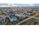 Aerial view of homes, walking paths and mountain views at 8726 Holman Cir, Arvada, CO 80005