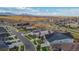 Community overview featuring homes with solar panels and mountain views at 8726 Holman Cir, Arvada, CO 80005