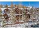 Exterior view of a row of townhouses in a snowy mountain setting at 518 S Ridge St # 518, Breckenridge, CO 80424