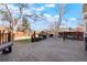 Spacious backyard with deck, hot tub, and wood fence at 11102 Zephyr St, Westminster, CO 80021