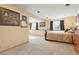 Finished basement area with a bedroom and dresser at 11102 Zephyr St, Westminster, CO 80021