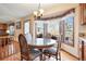 Bright dining area with bay window and seating for four at 11102 Zephyr St, Westminster, CO 80021