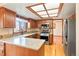 L-shaped kitchen with granite countertops and stainless steel appliances at 11102 Zephyr St, Westminster, CO 80021