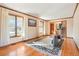 Hardwood floors, large windows, and exercise equipment at 11102 Zephyr St, Westminster, CO 80021