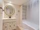 Basement bathroom with a shower/tub combo and updated vanity at 4446 S Xenia St, Denver, CO 80237