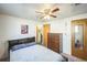 Spacious bedroom with a double bed and dresser at 1646 S Winona Ct, Denver, CO 80219