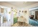 Eat-in kitchen with wood cabinets and tiled floor at 1646 S Winona Ct, Denver, CO 80219