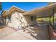 Brick house with attached carport and driveway at 1646 S Winona Ct, Denver, CO 80219