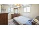 Cozy bedroom with double bed and dresser at 1646 S Winona Ct, Denver, CO 80219