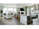 Open concept kitchen with island and stainless steel appliances at 16985 Black Rose Pl, Parker, CO 80134