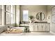 Elegant bathroom with soaking tub, double vanity, and walk-in shower at 16985 Black Rose Pl, Parker, CO 80134