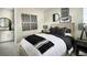 Modern bedroom with black and white decor and en-suite bathroom at 16985 Black Rose Pl, Parker, CO 80134
