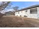 Large backyard with detached garage and ample space for outdoor activities at 5401 N Pecos St, Denver, CO 80221