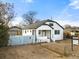 Newly remodeled home with white exterior and modern details at 5401 N Pecos St, Denver, CO 80221