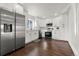 Modern white kitchen with stainless steel appliances at 5401 N Pecos St, Denver, CO 80221