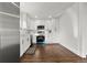 Modern kitchen, white cabinets, stainless steel appliances at 5401 N Pecos St, Denver, CO 80221