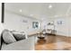 Bright living room with hardwood floors and stylish furniture at 5401 N Pecos St, Denver, CO 80221
