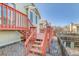 Back deck with stairs leading to the yard at 10475 W 82Nd Pl, Arvada, CO 80005