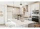 Modern kitchen with stainless steel appliances and an island at 7263 Goldbloom Ln, Littleton, CO 80125