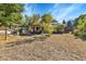 Large backyard with patio and grassy area at 435 Cody Dr, Lakewood, CO 80226