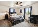 Spacious bedroom with a ceiling fan and plenty of natural light at 352 Antelope Run, Elizabeth, CO 80107