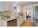 Modern kitchen with granite countertops, stainless steel appliances, and ample cabinet space at 6193 S Prescott St, Littleton, CO 80120