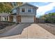 Two-story home with attached garage and driveway at 11010 Tennyson Pl, Westminster, CO 80031