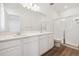 Modern bathroom with double vanity, shower, and toilet at 1266 Penner Dr, Erie, CO 80026