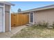 Front entrance with wooden gate and walkway at 9324 N Ingalls St, Westminster, CO 80031