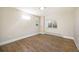 Bright and airy basement bedroom with hardwood floors at 301 W Harper St, Louisville, CO 80027