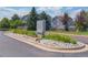 Community entrance with landscaping at 1333 S Cathay Ct # 101, Aurora, CO 80017